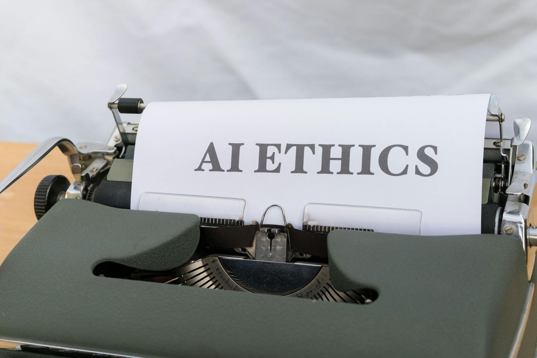 a typewriter with the word ethics on it